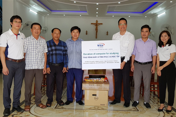 WHA Donates Computers for Studying to Nhan Hoa parish