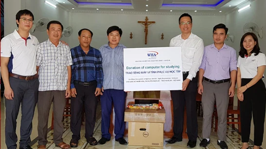WHA Donates Computers for Studying to Nhan Hoa parish